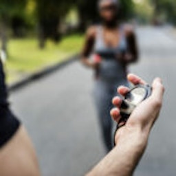 person looking at watch